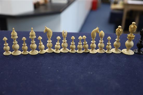 A mid 19th century Anglo Indian turned black stained and natural ivory chess set, kings 3.5in.